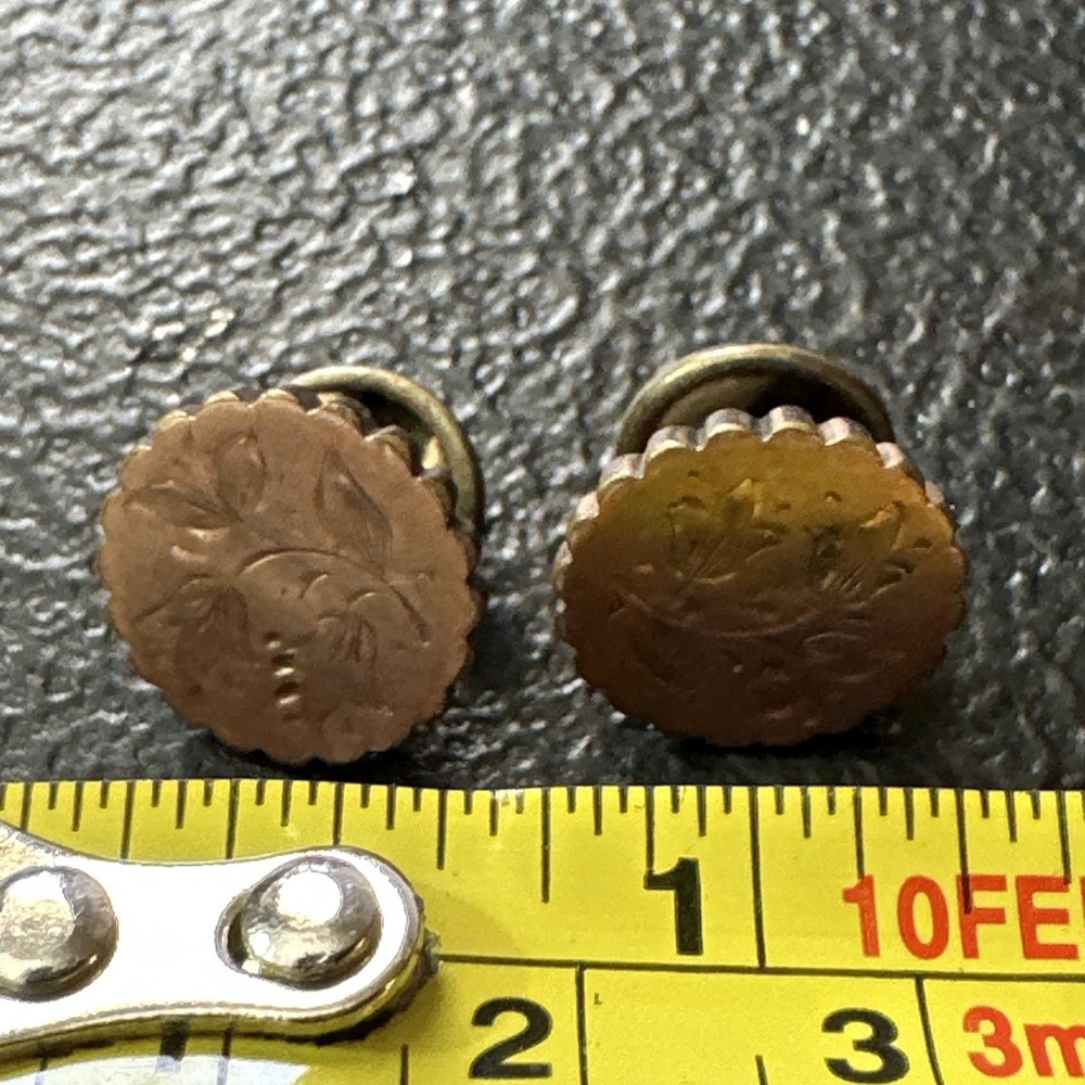 antique Copper-toned cuff links featuring engraved‎ floral